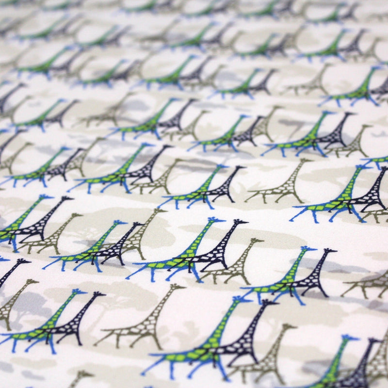 Tissu popeline de coton aux girafes bleues & baobab, fond blanc - TissusPapi.com