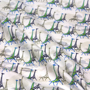 Tissu popeline de coton aux girafes bleues & baobab, fond blanc - TissusPapi.com