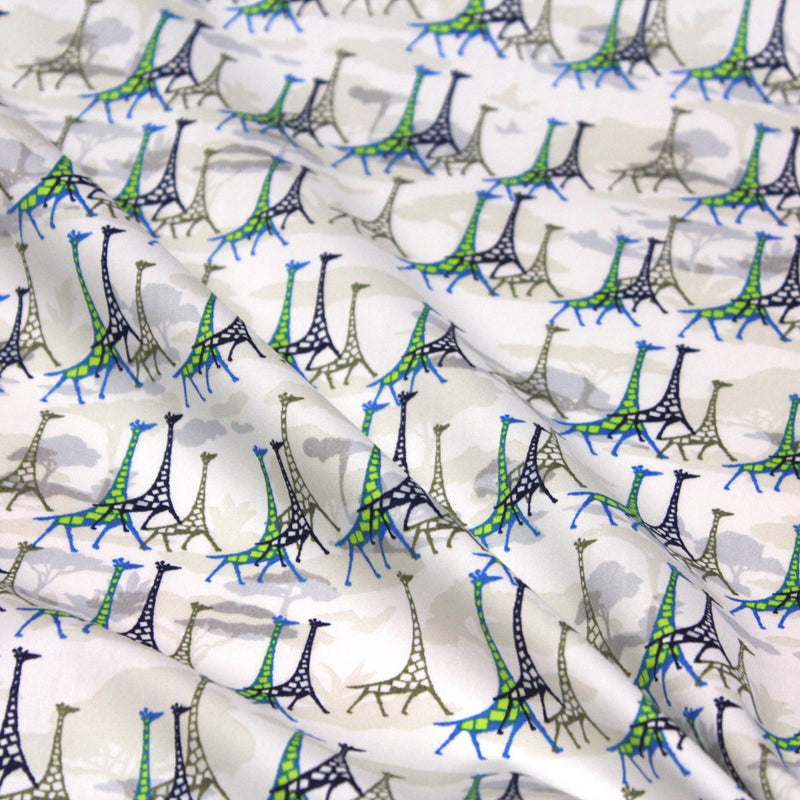 Tissu popeline de coton aux girafes bleues & baobab, fond blanc - TissusPapi.com