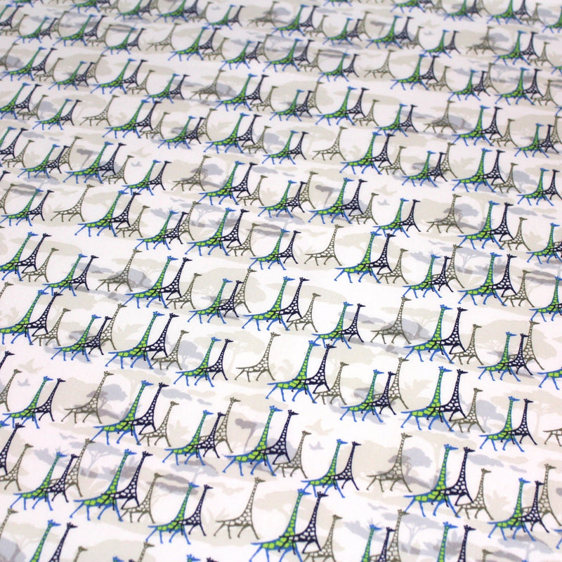 Tissu popeline de coton aux girafes bleues & baobab, fond blanc - TissusPapi.com