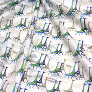 Tissu popeline de coton aux girafes bleues & baobab, fond blanc - TissusPapi.com