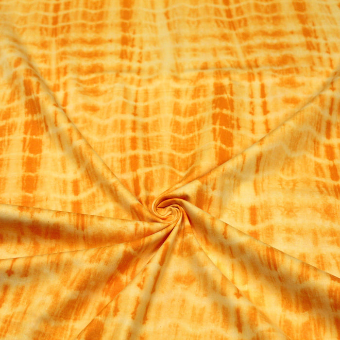 Tissu de coton tie & dye jaune bouton d'or