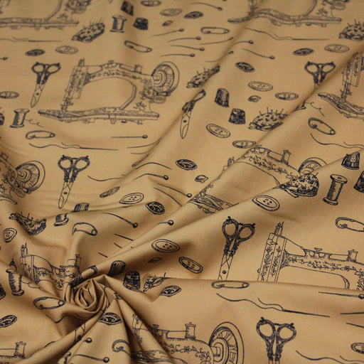 Tissu popeline de coton LA COUTURE, le petit matériel vintage, fond marron sépia - Oeko-Tex