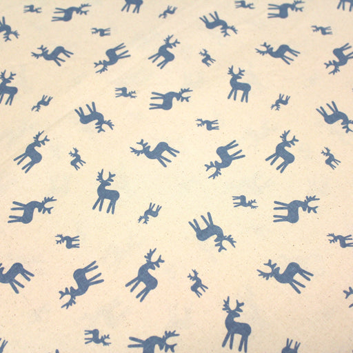 Tissu de coton de Noël scandinave aux rennes bleus, fond écru