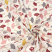 Tissu de coton motif traditionnel japonais aux feuilles de ginkgo roses, jaunes, bordeaux sur fond écru - Oeko-Tex