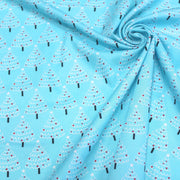 Tissu popeline de coton de Noël aux sapins blancs & rouges, fond bleu - TissusPapi.com