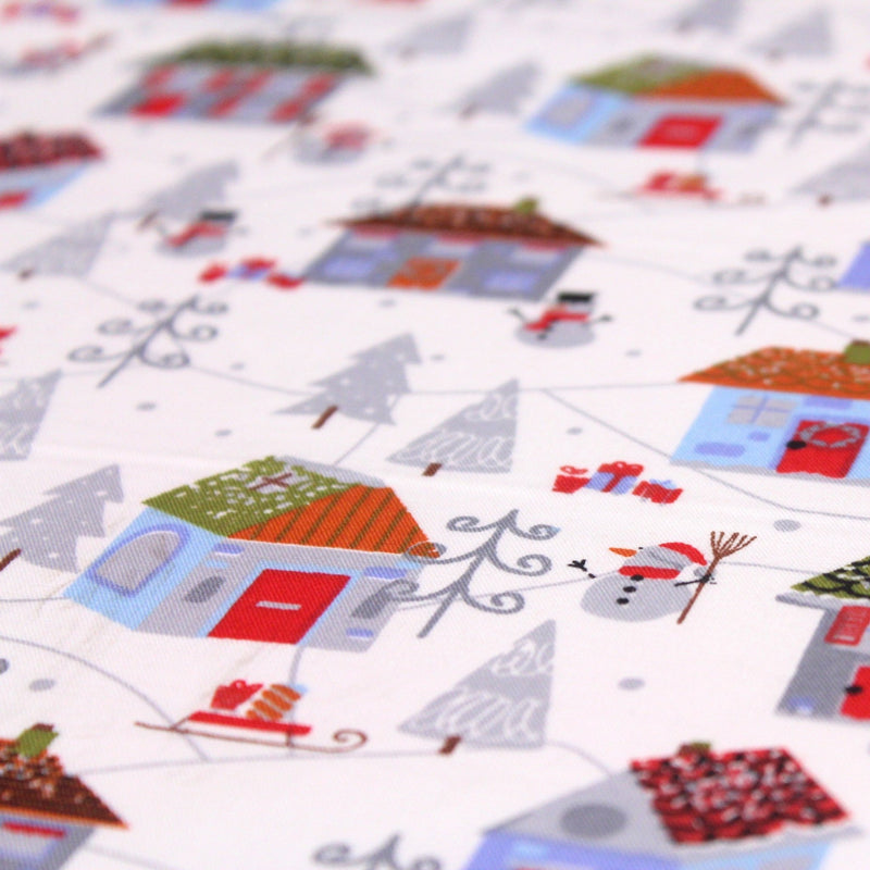 Tissu popeline de coton de Noël aux petites maisons & bonshommes de neige, fond blanc - TissusPapi.com