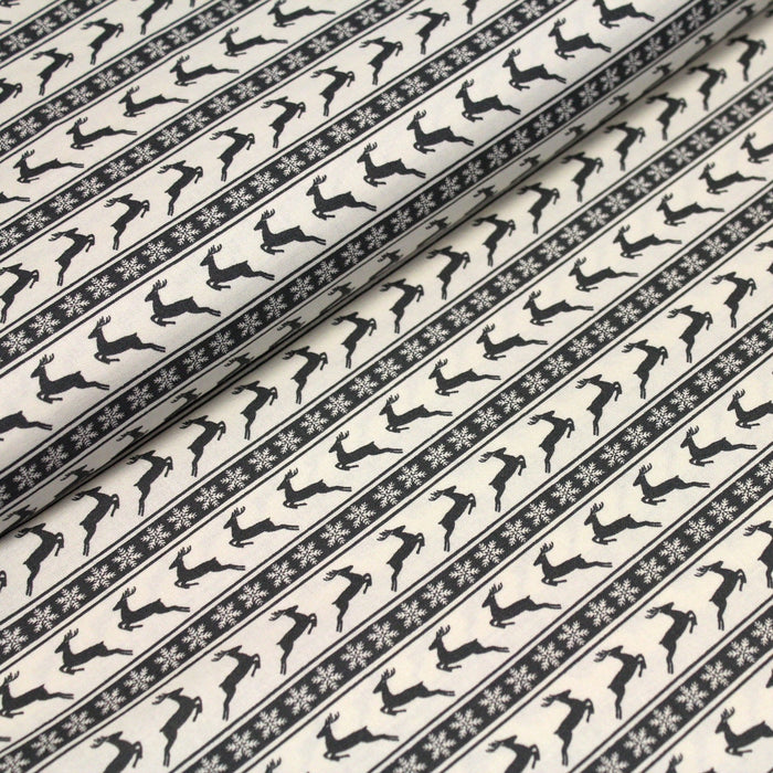 Tissu de coton de Noël scandinave aux rennes & étoiles de neiges gris, fond écru - TissusPapi.com