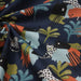 Tissu de coton JUNGLE STORY motif tropical & léopard blanc, fond bleu marine - OEKO-TEX®