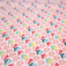 Tissu de coton ART DÉCO aux petits motifs géométriques roses, jaunes & verts, fond blanc - OEKO-TEX® - tissuspapi