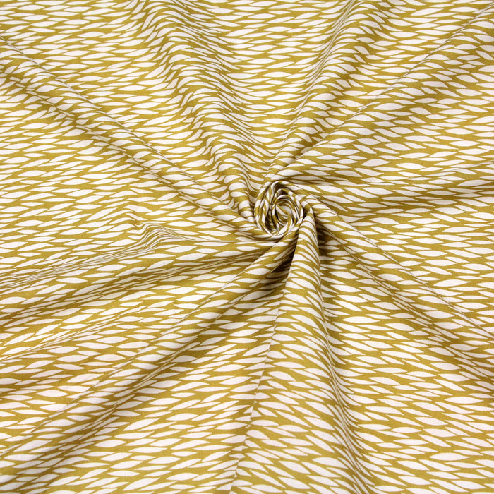 Tissu de coton aux gouttes blanches, fond ocre - OEKO-TEX®