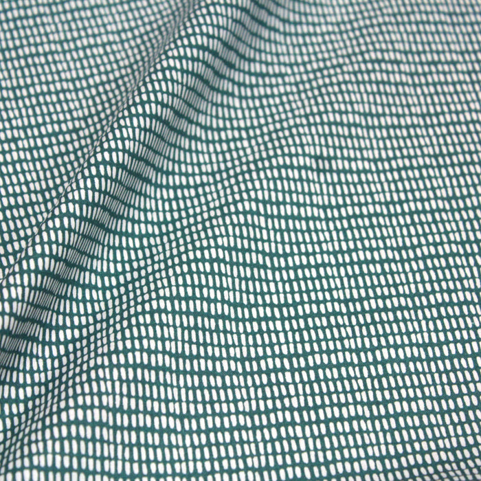 Tissu de coton aux petits tirets blancs, fond vert - OEKO-TEX®