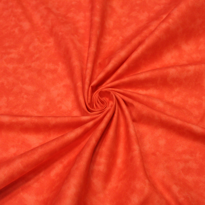 Tissu de coton Batik faux-uni marbré orange