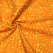 Tissu de coton Batik traditionnel safran aux pois jaunes
