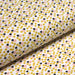 Tissu de coton aux petits motifs géométriques jaune safran, marron chocolat & rose, fond blanc - OEKO-TEX®