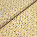 Tissu de coton aux petits triangles jaune safran, marron chocolat & rose, fond blanc - OEKO-TEX®