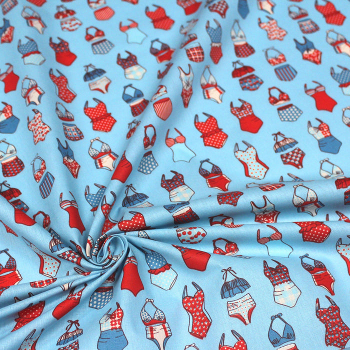 Tissu de coton aux maillots de bain & bikini, tons bleus blancs rouges, fond bleu - Oeko-Tex