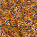 Tissu popeline de viscose ocre aux fleurs bleues et rouges - Fabrication française - Oeko-Tex