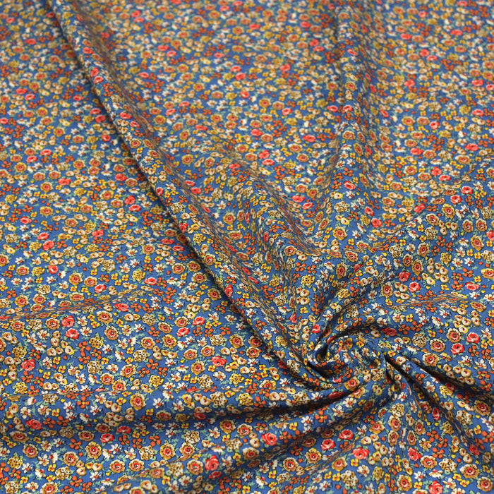 Tissu popeline de viscose bleue aux petites fleurs multicolores - Fabrication française - Oeko-Tex