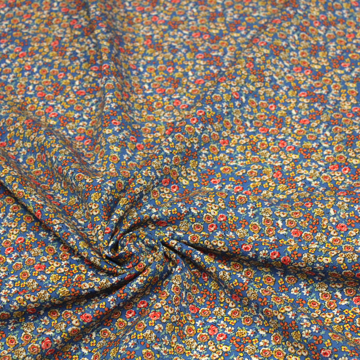 Tissu popeline de viscose bleue aux petites fleurs multicolores - Fabrication française - Oeko-Tex