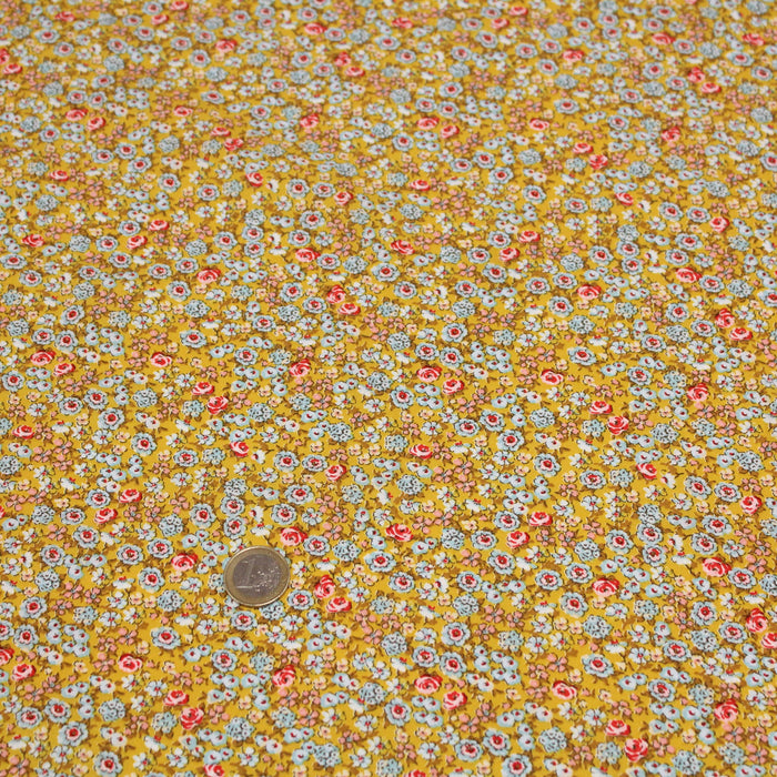 Tissu popeline de viscose jaune moutarde aux petites fleurs multicolores - Fabrication française - Oeko-Tex