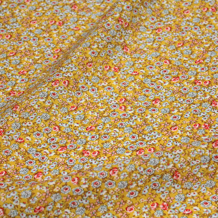 Tissu popeline de viscose jaune moutarde aux petites fleurs multicolores - Fabrication française - Oeko-Tex