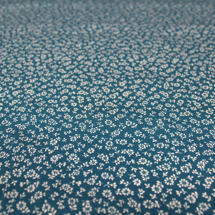 Tissu popeline de viscose bleu canard aux fines fleurs blanches - Fabrication française - Oeko-Tex