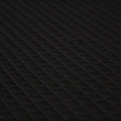 Tissu Jersey noir matelassé aux petits losanges - tissuspapi