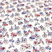 Tissu de coton aux petits vélos tricolores bleus blancs rouges, fond écru - Oeko - Tex - TissusPapi.com