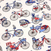 Tissu de coton aux petits vélos tricolores bleus blancs rouges, fond écru - Oeko - Tex - TissusPapi.com
