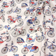 Tissu de coton aux petits vélos tricolores bleus blancs rouges, fond écru - Oeko - Tex - TissusPapi.com
