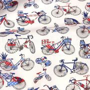 Tissu de coton aux petits vélos tricolores bleus blancs rouges, fond écru - Oeko - Tex - TissusPapi.com