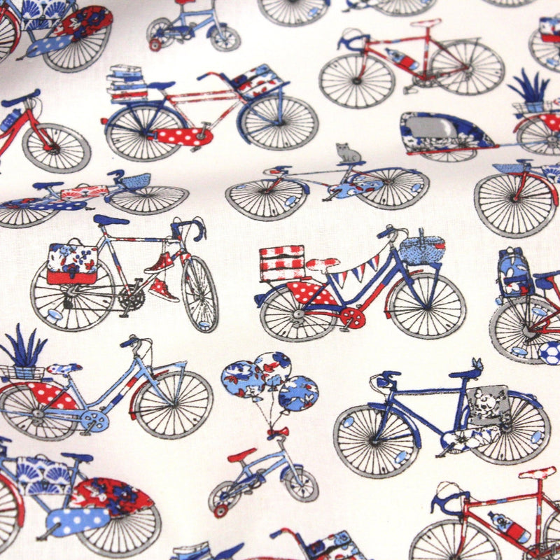 Tissu de coton aux petits vélos tricolores bleus blancs rouges, fond écru - Oeko - Tex - TissusPapi.com