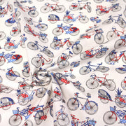 Tissu de coton aux petits vélos tricolores bleus blancs rouges, fond écru - Oeko - Tex - TissusPapi.com