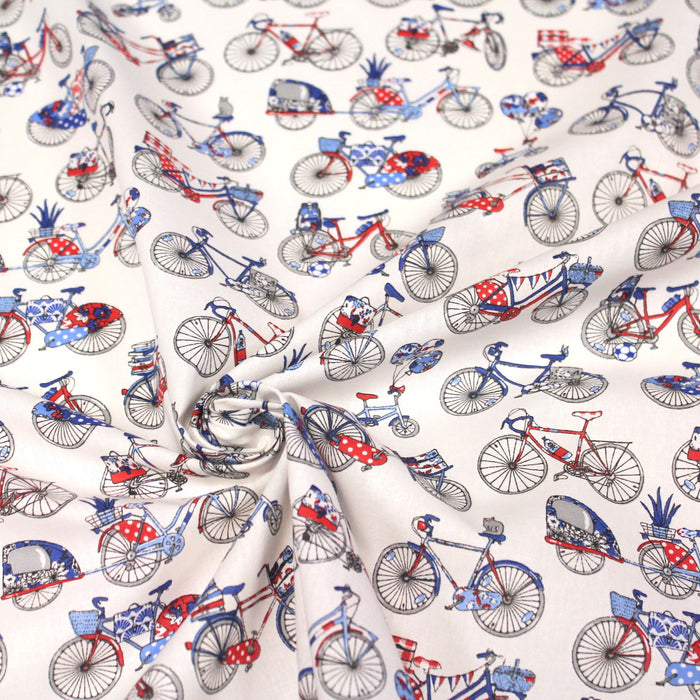 Tissu de coton aux petits vélos tricolores bleus blancs rouges, fond écru - Oeko-Tex