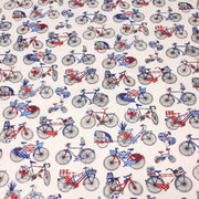 Tissu de coton aux petits vélos tricolores bleus blancs rouges, fond écru - Oeko - Tex - TissusPapi.com