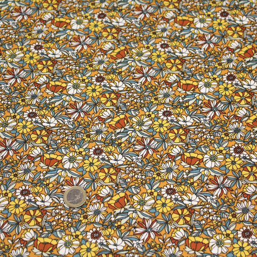 Tissu de coton LOUISE aux fleurs jaunes, blanches & vertes, fond jaune orangé - Oeko-Tex
