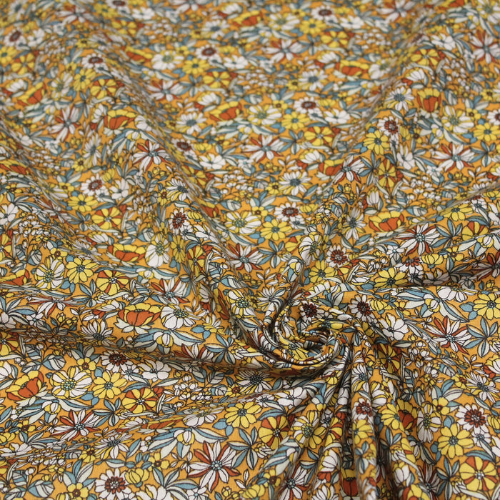 Tissu de coton LOUISE aux fleurs jaunes, blanches & vertes, fond jaune orangé - Oeko-Tex