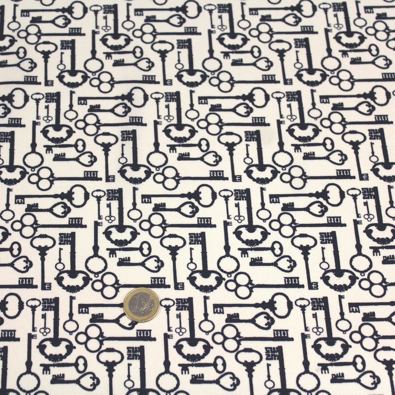 Tissu popeline de coton aux clefs vintage bleu marine, fond écru - TissusPapi.com