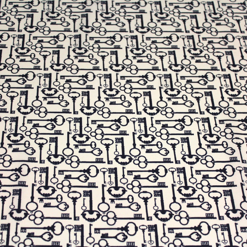 Tissu popeline de coton aux clefs vintage bleu marine, fond écru - TissusPapi.com