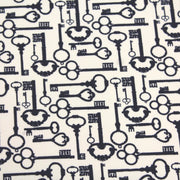 Tissu popeline de coton aux clefs vintage bleu marine, fond écru - TissusPapi.com