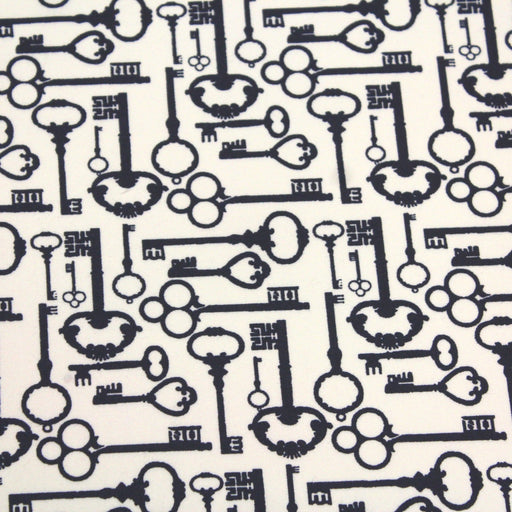 Tissu popeline de coton aux clefs vintage bleu marine, fond écru - TissusPapi.com