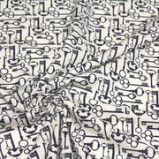 Tissu popeline de coton aux clefs vintage bleu marine, fond écru - TissusPapi.com