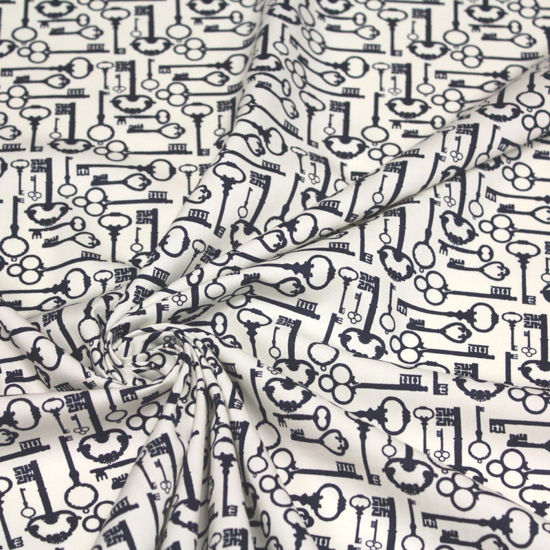 Tissu popeline de coton aux clefs vintage bleu marine, fond écru - TissusPapi.com