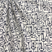 Tissu popeline de coton aux clefs vintage bleu marine, fond écru - TissusPapi.com