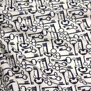 Tissu popeline de coton aux clefs vintage bleu marine, fond écru - TissusPapi.com