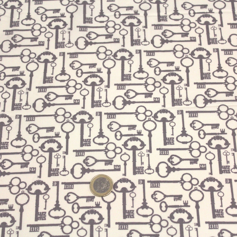 Tissu popeline de coton aux clefs vintage taupe, fond écru - TissusPapi.com