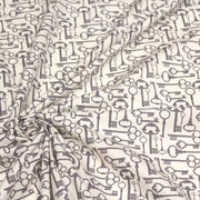 Tissu popeline de coton aux clefs vintage taupe, fond écru - TissusPapi.com