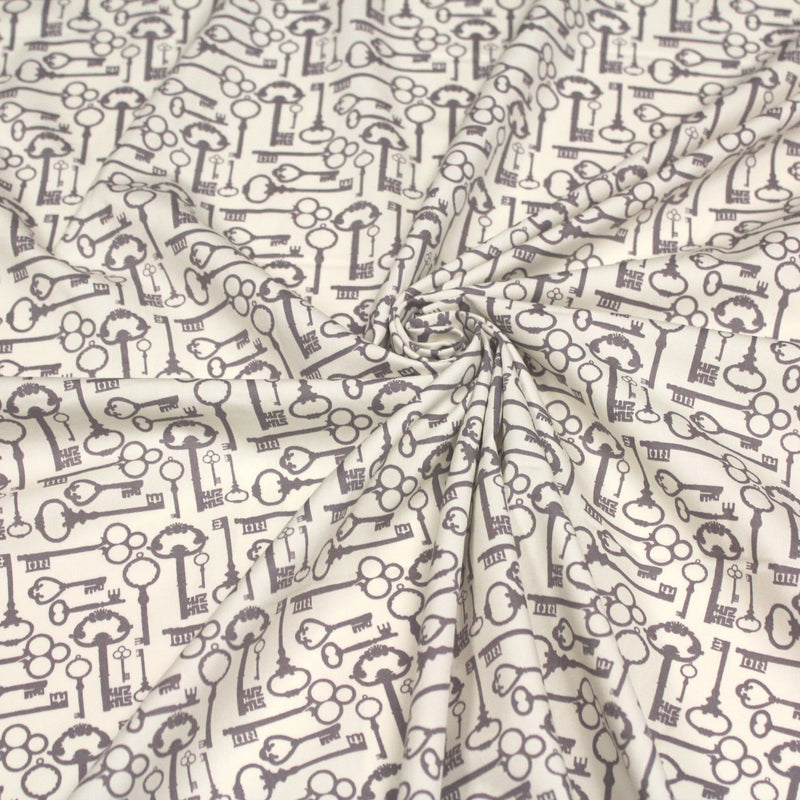 Tissu popeline de coton aux clefs vintage taupe, fond écru - TissusPapi.com
