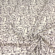 Tissu popeline de coton aux clefs vintage taupe, fond écru - TissusPapi.com